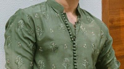Baju koko warna sage dengan bordir motif bunga